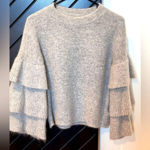 Endless Rose sweater with showstopper statement sleeves.Size S. Great condition.